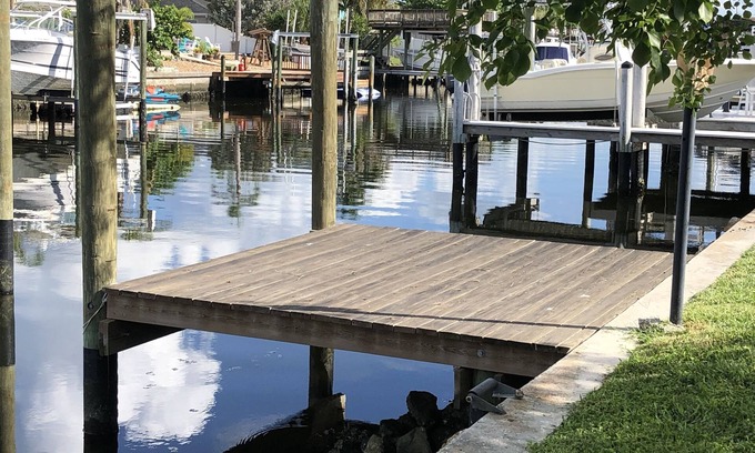 Bal Harbour House | Lovely House on the canal with private dock, large fenced yard & pet friendly