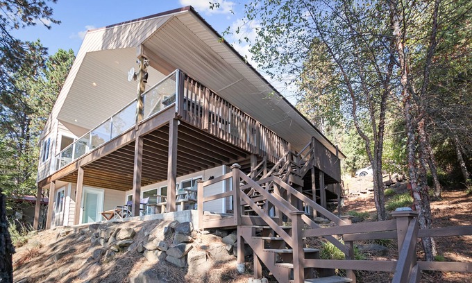 Worley House | Lovely Oasis in the Trees w/Wraparound Deck, Lake View, Pool Table, & Game Room