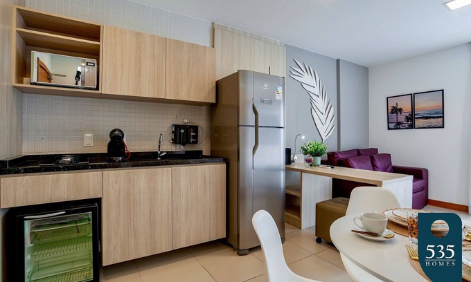Caminho das Arvores Apartment | Lovely Suite Compact Kitchen in Central Region