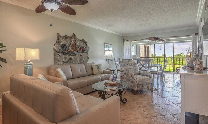 Mid Island Condo | LOVELY WATERFRONT BAY VILLAGE 2B/2B CONDO! WALK TO BEACH!