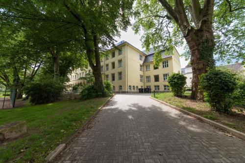Frohnhausen Apartment | Lunas Appartements in der alten Schule Essen