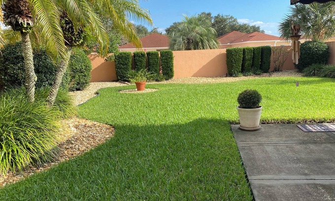 De La Mesa Villa | Lush green patio garden villa, excellent location. Golf cart included!