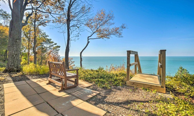 Riverside House | Luxe Waterfront Haven: Private Beach, Hot Tub