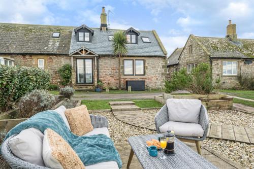 Boulmer House | Luxurious & modern on-the-beach family retreat