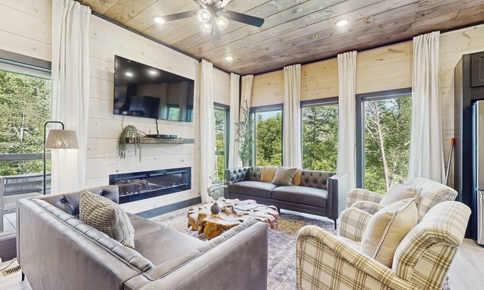 Sevierville Cabin | Luxurious Pool Cabin w/theater room, game room, hot tub, decks, grill, and WiFi