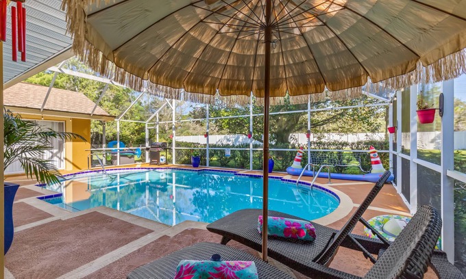 Brooksville House | Luxurious Roman Style Pool Home in Brooksville Near Weeki Wachee and Beaches