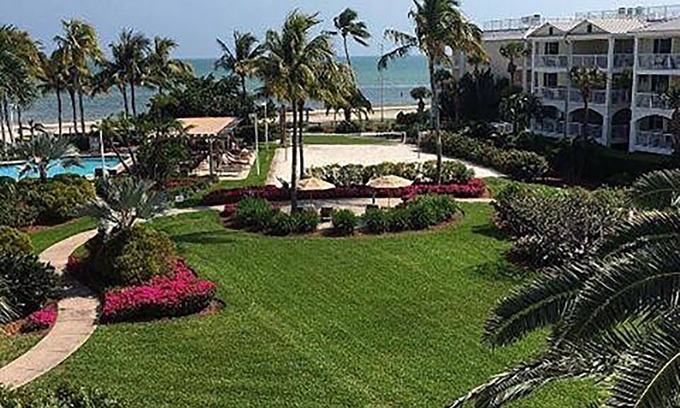 Key West Resort | Luxurious top floor, end unit, within premier resort on the Atlantic Ocean.
