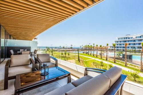 Torremolinos Apartment | Luxury beachfront 3BR in Nereidas with Pools Spa Gym