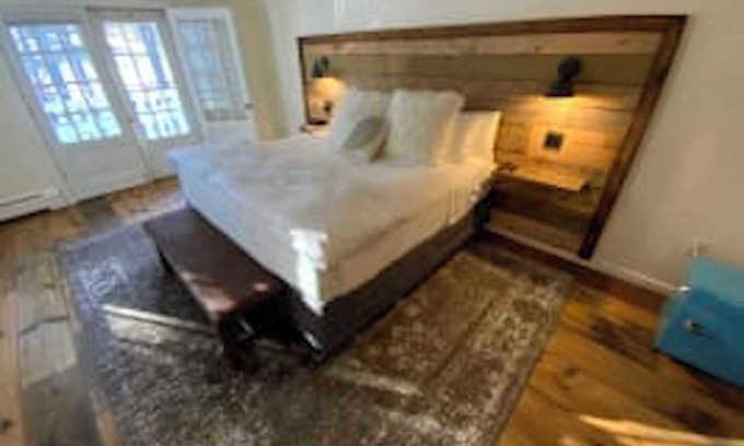 West Dover Resort | Luxury King Suite, Living Room w/sofa bed, balcony, & 1.5 baths