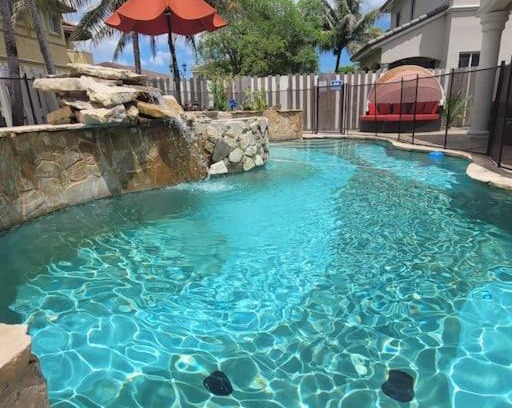 Tamiami House | Luxury mansion with pool jacuzzi BBQ for ultimate scape