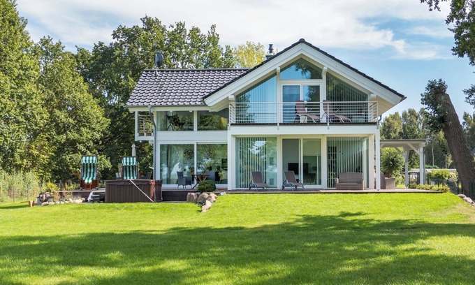 Bodstedt House | Luxury & nature combined * Holiday home with a view of the water and nature reserve