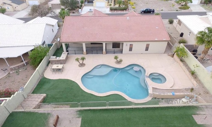 Sunridge Estates House | Luxury Pool Home 5 MINUTES from Lake, River, & Casinos!