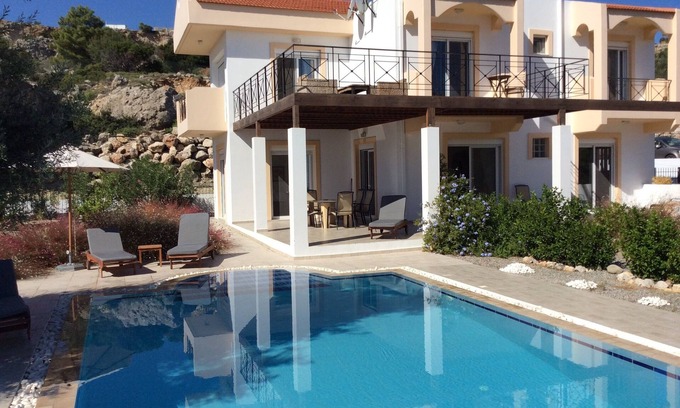 Archangelos Villa | Luxury Villa. Overlooks Tsampika Beach. Large private pool. 4 bedrooms.