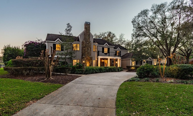 Lutz House | Majestic Brant Manor: Stately 8 Bdrm, Lakefront Manor w/Pool, 15Min to City