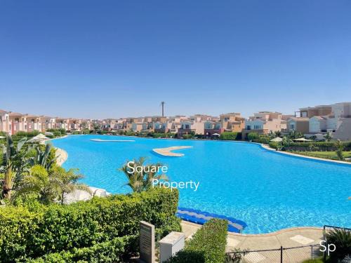 Sidi Abd El-Rahman Ski Chalet | Marassi Luxurious 2 bedrooms Direct Lagoon -Steps to the Beach ,El Alamein hotel& Marina