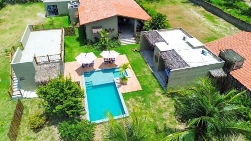 Passo de Camaragibe House | MHV Milagres - Casa Aruã, Luxo, Conforto e Privacidade a 60 metros da Exclusiva Praia do Marceneiro