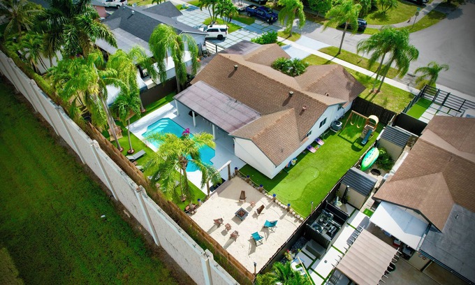 Palmetto Estates House | Miami house, Heated pool, Artificial beach, Mini golf, luxury and comfort