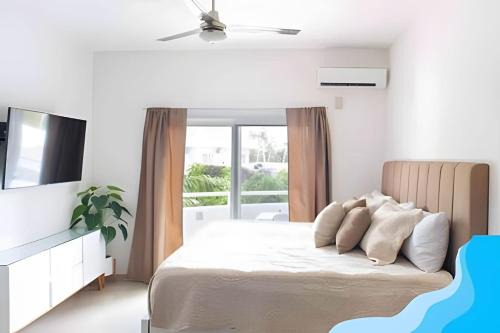 Punta Sam Apartment | Minimalist Studio with Pool and FREE Scooter