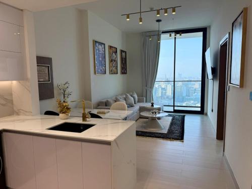 Jumeirah Village Circle Apartment | Modern 1BD APT In Binghatti Burj Khalifa Skyline
