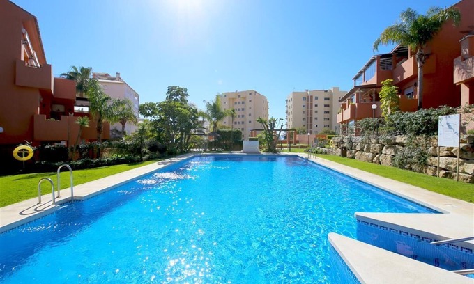 Estepona Apartment | Modern and bright apartment with communal pool, Estepona port near restaurants, bars and beaches