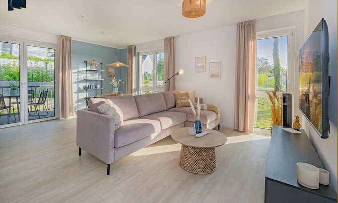 Koelpinsee Apartment | Modern bluefish hut with balcony - only 800 m to the beach