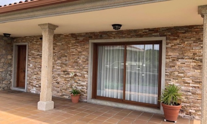 Tomino House | Modern Galician-style house with stunning views of vineyards and Portugal