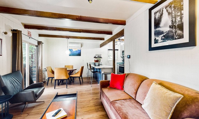 Fish Camp House | Modern lower unit duplex cabin with fireplace, balcony, & EV charger