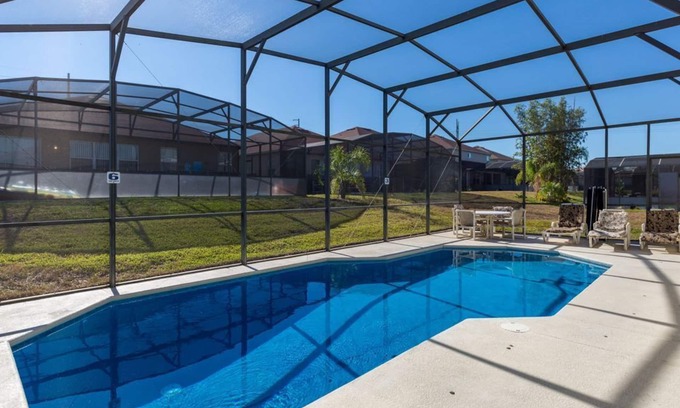 Windwood Bay House | Modern pool home with Game Room, 2 en suites and just 15 minutes to Theme Parks!