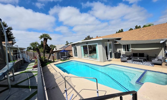 University City House | Modern Retreat with Pool, Game Room,Playhouse, Fenced Yard.