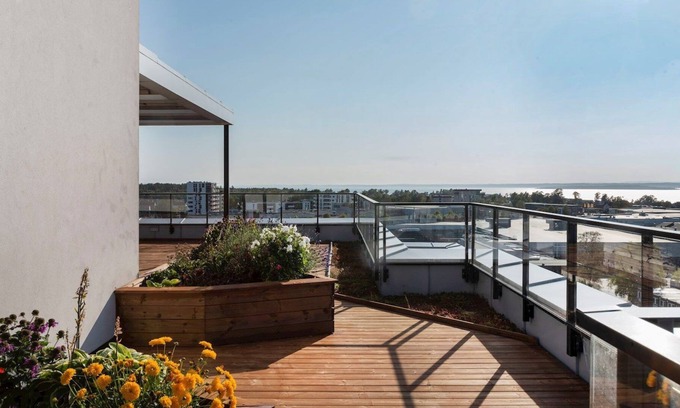 Moss Municipality Condo | Modern Scandinavian apartment with two balconies, roof top terrace and parking.