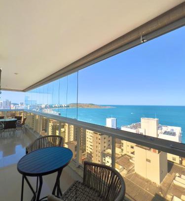 Praia do Morro Apartment | Momentos inesquecíveis em um novo e moderno apto na Praia do Morro, com deslumbrante vista mar, a uma quadra da praia, redes de proteção, quartos com ar condicionado, roupas de cama e banho, TV 65, internet, prédio com piscina, portaria 24 horas e 2 vagas