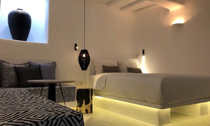 Platis Gialos Apartment | Mykonian Mews H1 Luxury Cave Suite with outdoor jacuzzi, lounge and cuisinette