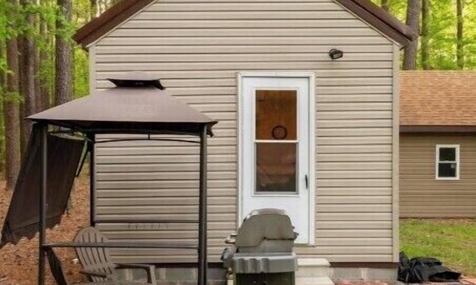 Cambridge Cottage | nCozy retreat in peaceful wooded setting. Pet friendly!