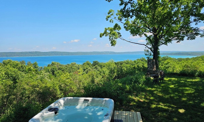 Frankfort Cottage | New! Above Crystal Lake - Hot Tub and Stunning Hilltop Views for Stargazers and Nature Lovers! Window A/C Unit in Bedroom!