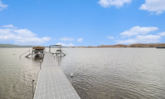 Silver Lake House | NEW LISTING: Beautiful cottage on the shores of Silver Lake with stunning water & dune views.