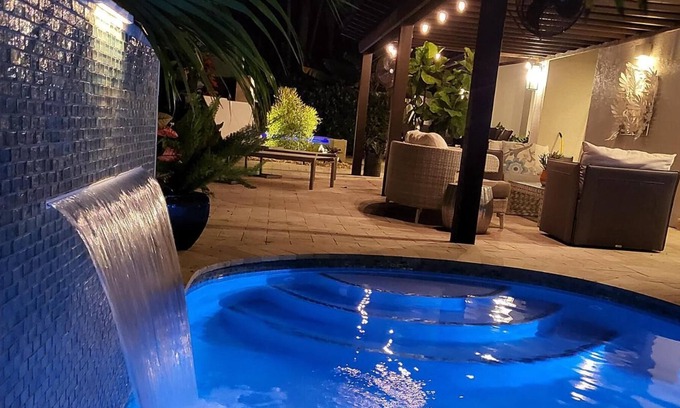 Dolphin Isles House | NEW LISTING! Tropical Beach Villa with Heated Pool and Spa