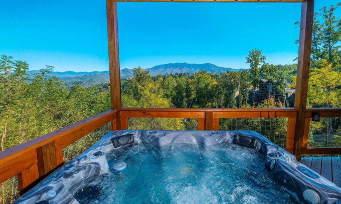 Chalet Village North Cabin | NEW Luxury 3-story cabin! MTN Views Hot Tub, Game Room, Fire Pit- Summer Pools!