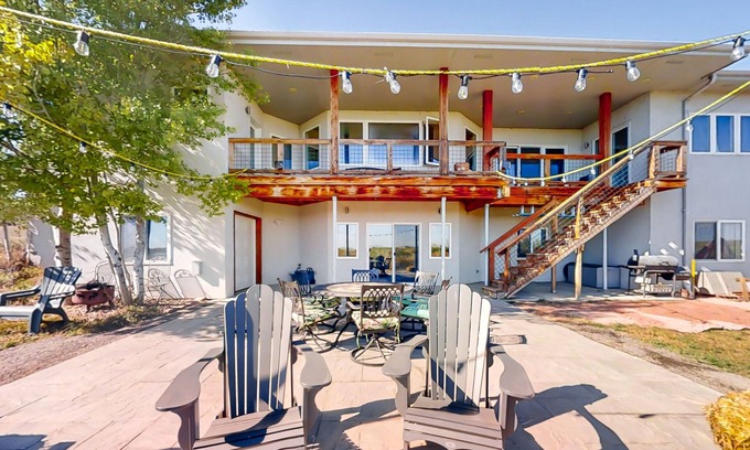 Fort Collins House | Newly built walkout basement with water views, patio, & Ping-Pong table