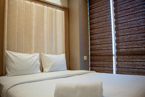 Menteng Apartment | Nice and Homey 2BR Apartment at Capitol Park Residence By Travelio