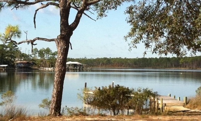 Perdido Beach Cottage | nnCharming Waterfront Retreat on Palmetto Creekn