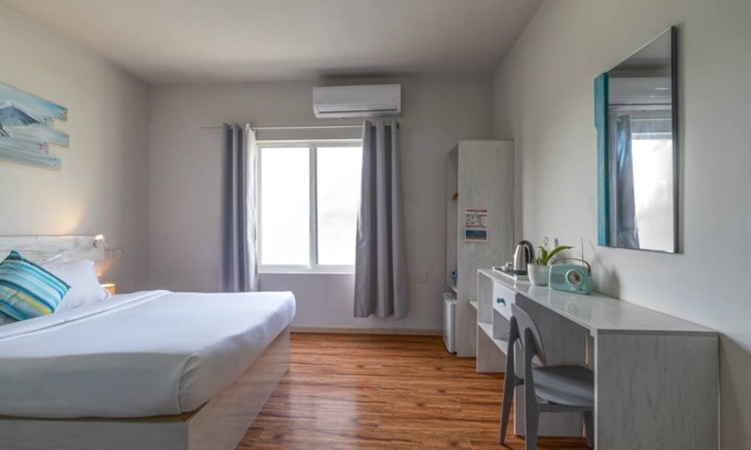 Cocoa Island Hotel | Ocean Pearl : Deluxe Triple Room
