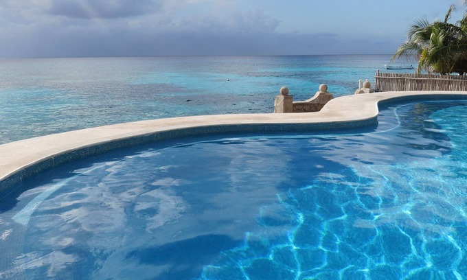 San Miguel Condo | Oceanfront condo on the bluest ocean of Cozumel island