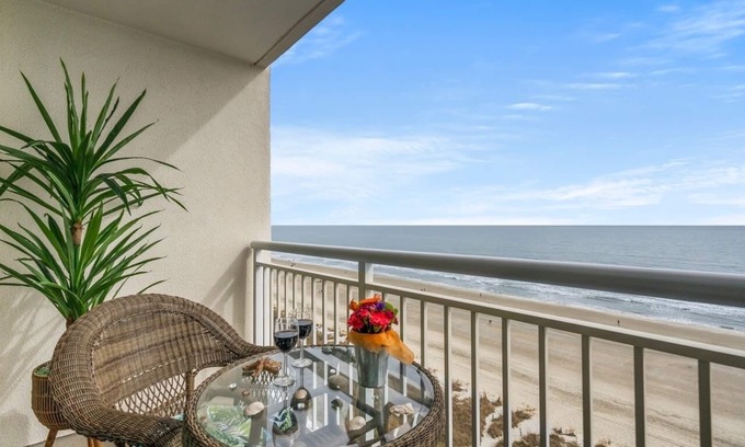 Crescent Beach Resort | Oceanfront Paradise Beachfront resort style amenities w/NO Hidden Resort Fees!