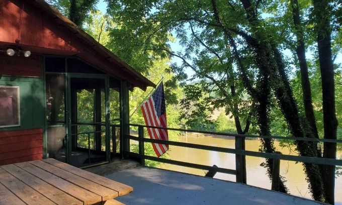 Williams Cabin | On The Rocks! Little River cabin sitting high on the banks of the White River n