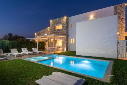 Archangelos Villa | OSSIANO POOL VILLAS, Heating Pool, 2 min drive to Haraki Beach & 10 to Lindos