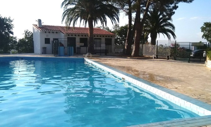 Laroque-des-Alberes Apartment | Panoramic view, with swimming pool: between sea and mountains, in a peaceful setting.