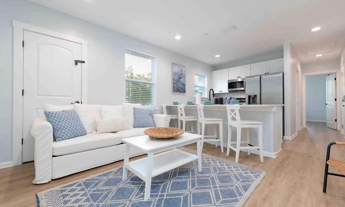 Neptune Beach Apartment | Peaceful coastal Condo - walk to the beach!