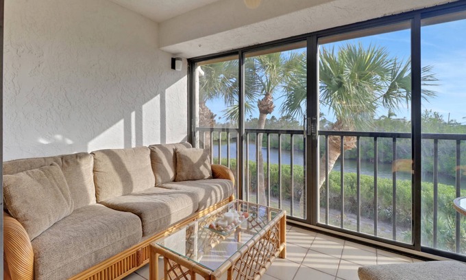 Mid Island Condo | Peaceful Lagoon-Front Condo Community, South of Mid-Island! Heated Community Pool, Free Parking!