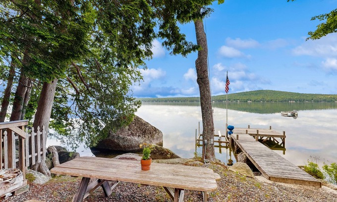 Otis House | Peaceful Lakefront Escape with Outdoor Dining, Beach Access, Deck & Firepit