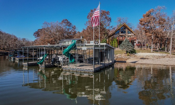 Climax Springs House | Perfect for the family: quiet cove, private beach, hot tub, boat slips and more!